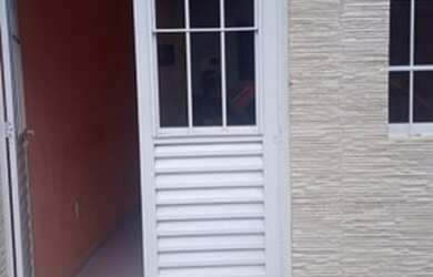 Imagem: A casa possui 2 Dormitórios, 2 Banheiros e está localizado