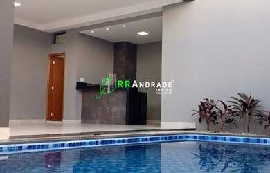 Imagem: A casa possui 3 Dormitórios, 2 Banheiros, 4 Vagas na garagem