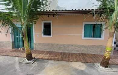 Imagem: A casa possui 2 Dormitórios e 2 Vagas na garagem e está localizado