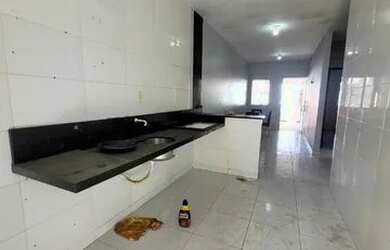 Imagem: A casa possui 2 Dormitórios, 2 Banheiros, 1 Vaga na garagem