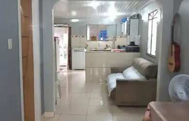 Imagem: A casa possui 2 Dormitórios, 1 Banheiro, 1 Vaga na garagem