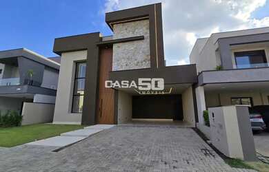 Imagem: A casa em condomínio possui 3 Dormitórios, 5 Banheiros, 4