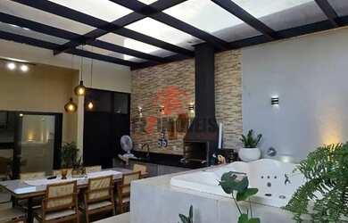 Imagem: A casa possui 3 Dormitórios, 2 Banheiros, 4 Vagas na garagem