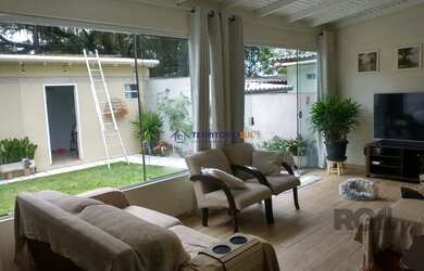 Imagem: A casa possui 2 Dormitórios, 3 Banheiros, 2 Vagas na garagem