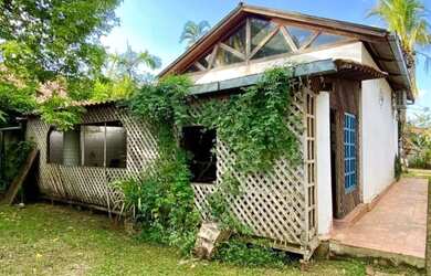 Imagem: A casa possui 2 Dormitórios, 2 Banheiros, 3 Vagas na garagem