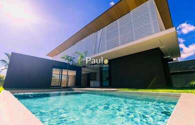 Imagem: A casa em condomínio possui 4 Dormitórios, 5 Banheiros, 4