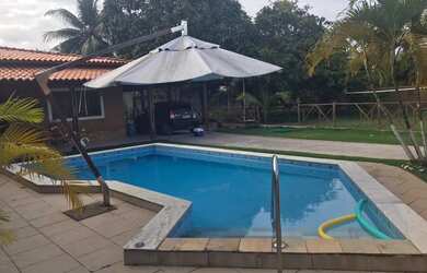 Imagem: A casa possui 4 Dormitórios, 5 Vagas na garagem e está localizado