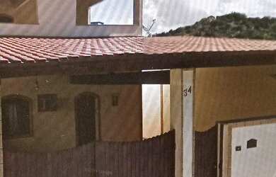 Imagem: A casa possui 3 Dormitórios, 4 Banheiros, 2 Vagas na garagem