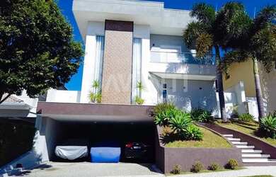 Imagem: A casa em condomínio possui 4 Dormitórios, 5 Banheiros, 3