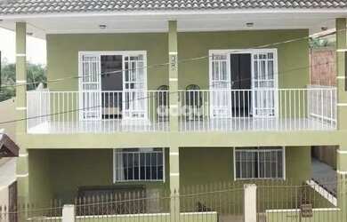 Imagem: A casa possui 5 Dormitórios, 1 Banheiro, 5 Vagas na garagem