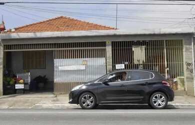 Imagem: A casa possui 3 Dormitórios, 3 Banheiros, 3 Vagas na garagem