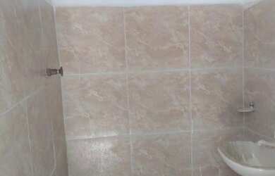 Imagem: A casa possui 3 Dormitórios e 1 Banheiro e está localizado