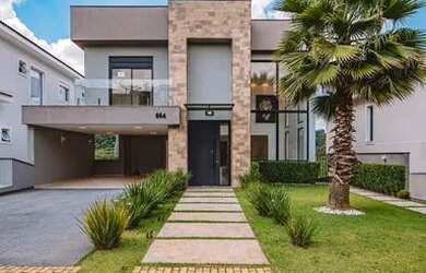 Imagem: A casa em condomínio possui 3 Dormitórios, 5 Banheiros, 4