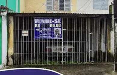 Imagem: A casa possui 3 Dormitórios, 1 Banheiro, 1 Vaga na garagem