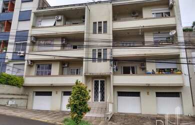 Imagem: O apartamento possui 4 Dormitórios, 2 Banheiros, 2 Vagas na