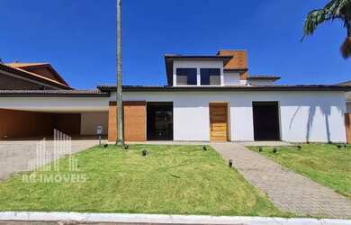 Imagem: A casa em condomínio possui 5 Dormitórios, 5 Banheiros, 5