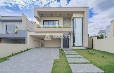 Imagem: A casa em condomínio possui 4 Dormitórios, 5 Banheiros, 2