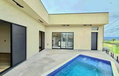 Imagem: A casa possui 3 Dormitórios, 3 Banheiros, 2 Vagas na garagem