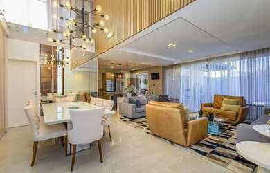 Imagem: A casa possui 3 Dormitórios, 4 Banheiros, 5 Vagas na garagem