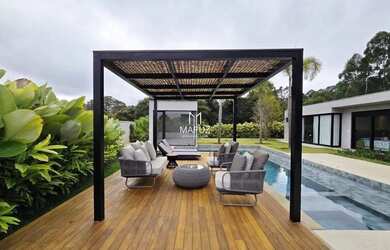 Imagem: A casa possui 5 Dormitórios, 5 Banheiros, 5 Vagas na garagem