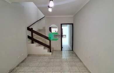 Imagem: A casa possui 2 Dormitórios, 3 Banheiros, 1 Vaga na garagem