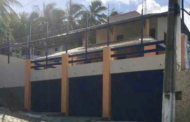 Imagem: A casa possui 4 Dormitórios, 5 Banheiros, 5 Vagas na garagem