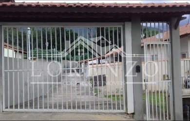 Imagem: A casa possui 2 Dormitórios, 1 Banheiro, 2 Vagas na garagem