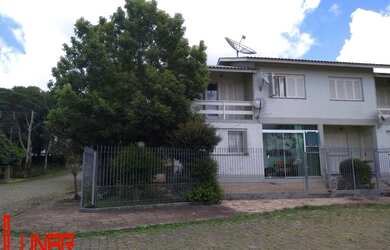 Imagem: A casa possui 3 Dormitórios, 2 Banheiros, 2 Vagas na garagem