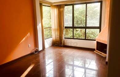 Imagem: O apartamento possui 3 Dormitórios, 1 Banheiro, 1 Vaga na garagem