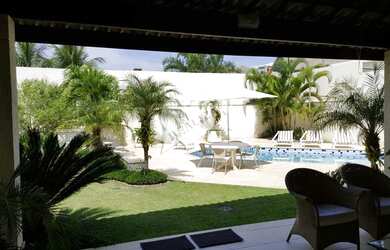 Imagem: A casa em condomínio possui 5 Dormitórios, 5 Banheiros, 5