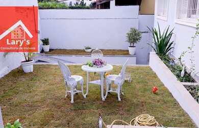 Imagem: A casa possui 3 Dormitórios, 4 Banheiros, 5 Vagas na garagem