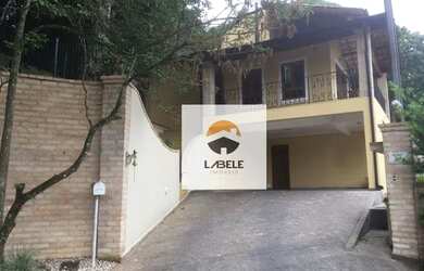 Imagem: A casa em condomínio possui 4 Dormitórios, 4 Banheiros, 5