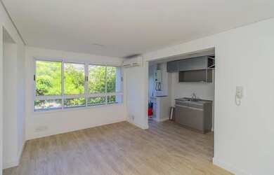 Imagem: O apartamento possui 2 Dormitórios, 1 Banheiro, 1 Vaga na garagem