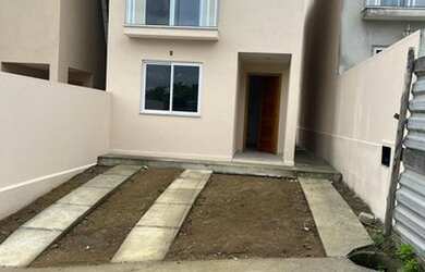 Imagem: A casa em condomínio possui 2 Dormitórios, 3 Banheiros, 2