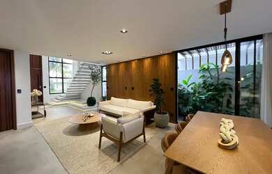 Imagem: A casa possui 3 Dormitórios, 5 Banheiros, 2 Vagas na garagem