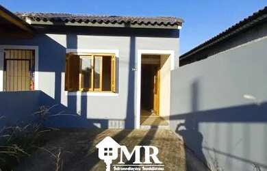 Imagem: A casa possui 2 Dormitórios, 1 Banheiro, 1 Vaga na garagem