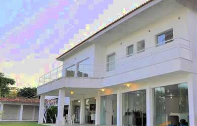 Imagem: A casa em condomínio possui 5 Dormitórios, 5 Banheiros, 4