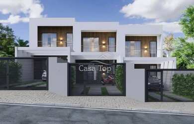 Imagem: A casa possui 3 Dormitórios, 3 Banheiros, 3 Vagas na garagem