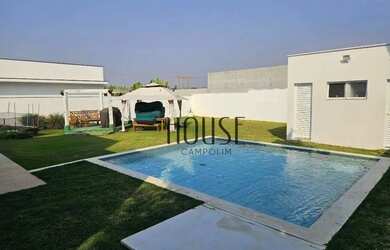 Imagem: A casa em condomínio possui 5 Dormitórios, 5 Banheiros, 5