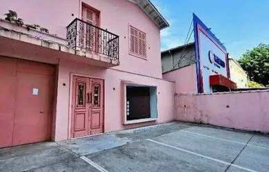 Imagem: A casa possui 2 Dormitórios, 4 Banheiros, 4 Vagas na garagem