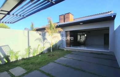 Imagem: A casa possui 3 Dormitórios, 2 Banheiros, 2 Vagas na garagem