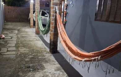 Imagem: A casa possui 3 Dormitórios, 2 Banheiros, 3 Vagas na garagem