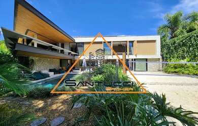 Imagem: A casa em condomínio possui 4 Dormitórios, 5 Banheiros, 4