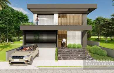 Imagem: A casa possui 4 Dormitórios, 5 Banheiros, 2 Vagas na garagem