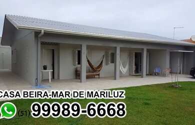 Imagem: A casa possui 4 Dormitórios, Acomodam 11 pessoas e 3 Vagas