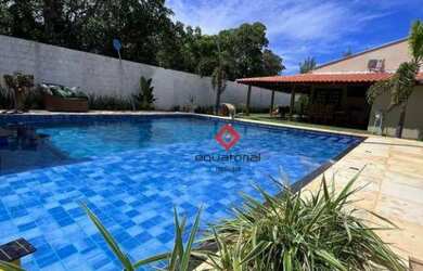 Imagem: A casa possui 3 Dormitórios, 3 Banheiros, 5 Vagas na garagem