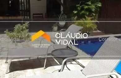 Imagem: A casa possui 3 Dormitórios, 5 Banheiros, 2 Vagas na garagem