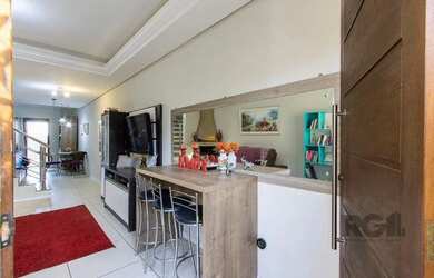 Imagem 2: Casa em Hípica. Churrasqueira, Lareira, 1 Vaga na garageme3 Dormitórios