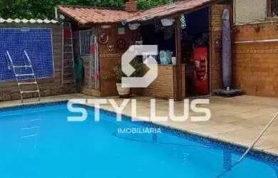 Imagem: A casa possui 5 Dormitórios, 5 Banheiros, 1 Vaga na garagem