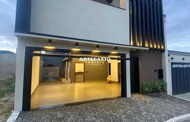 Imagem: A casa possui 3 Dormitórios, 4 Banheiros, 3 Vagas na garagem